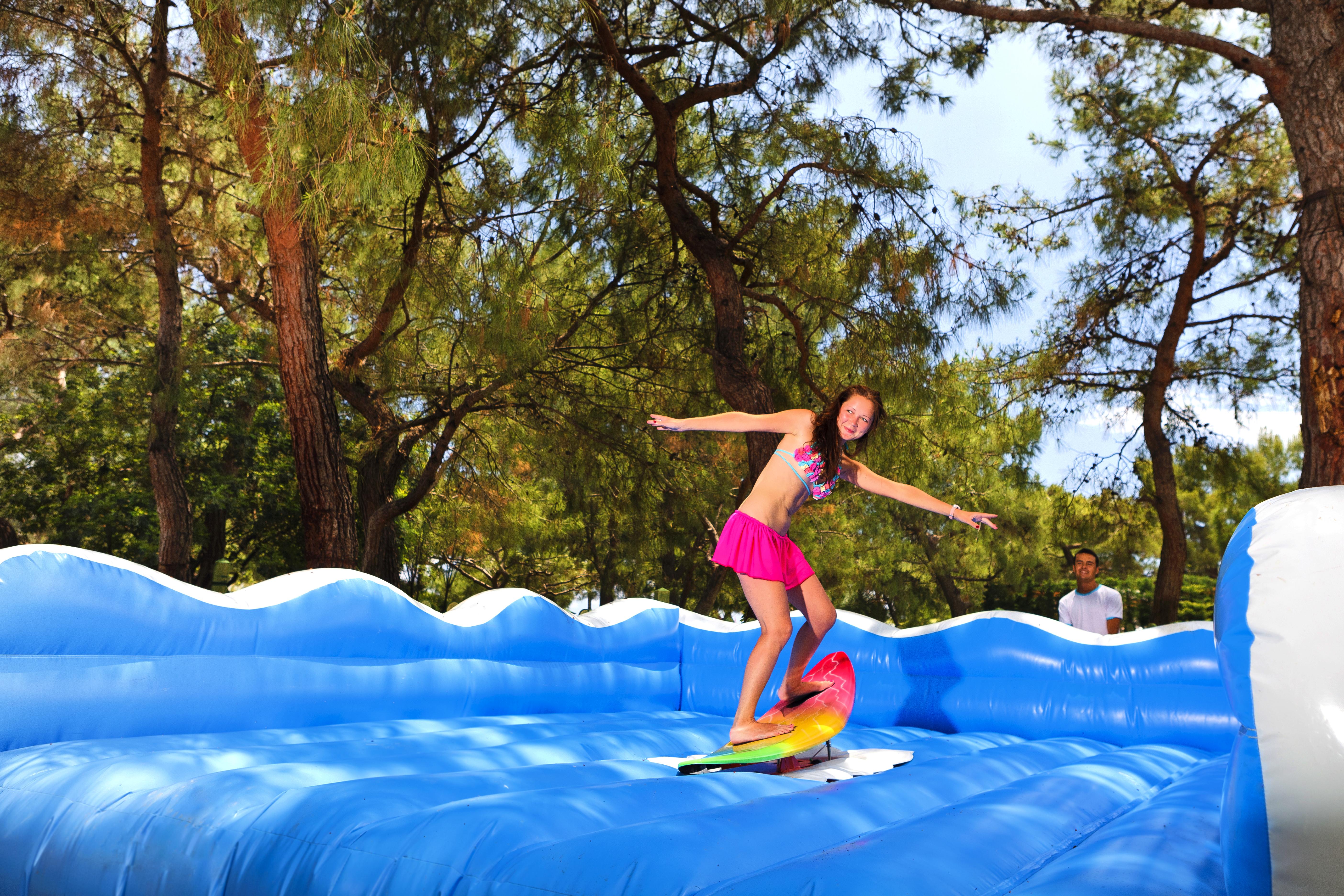 Marti Myra Hotel Tekirova Exterior photo A girl on an inflatable water slide