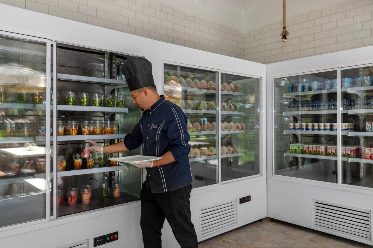 Marti Myra Hotel Tekirova Exterior photo A chef using a refrigerator