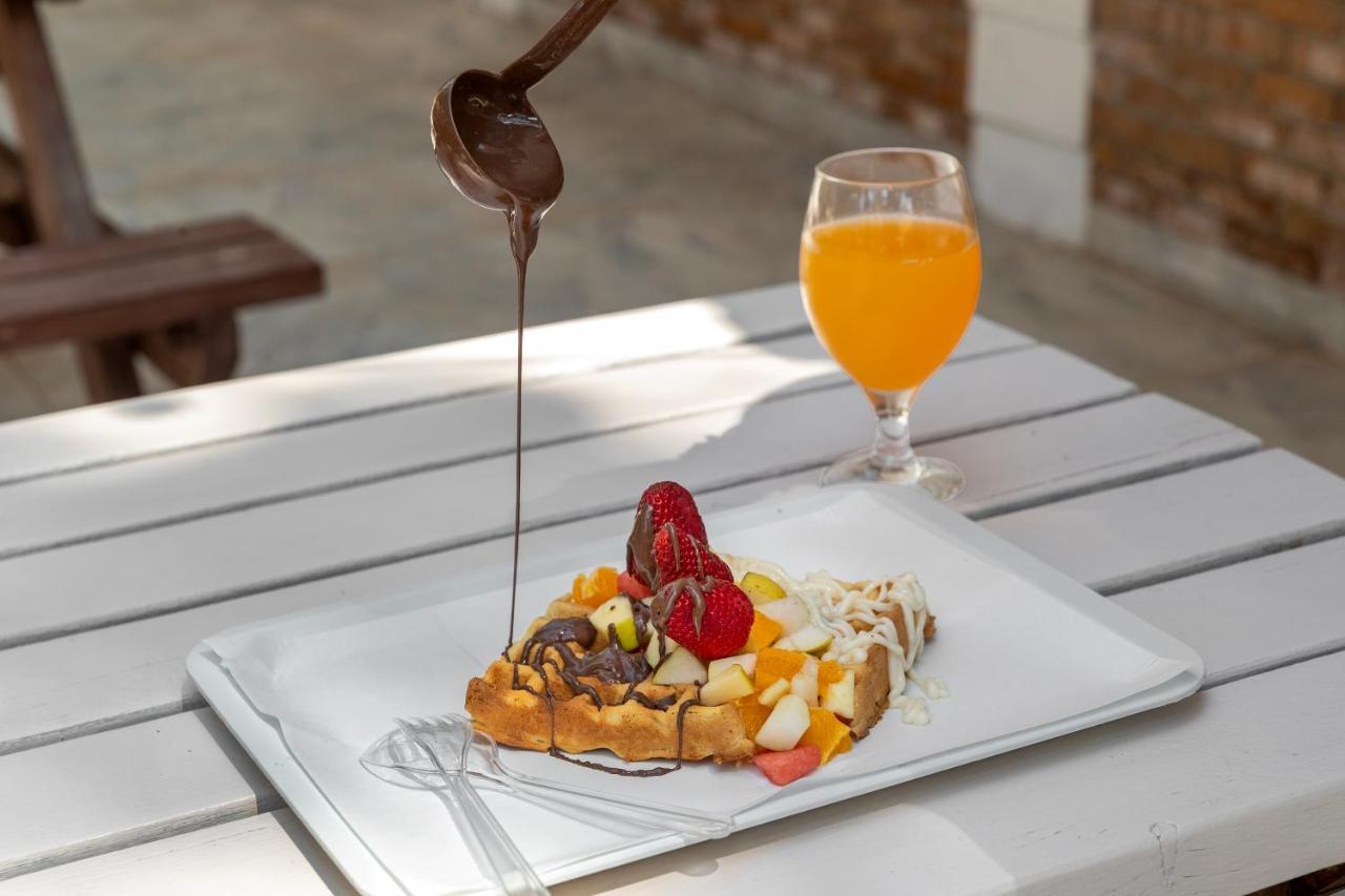 Marti Myra Hotel Tekirova Exterior photo Chocolate being drizzled over a fruit salad